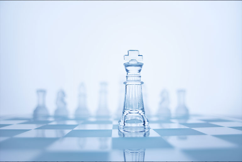 Clear chess board representing Leadership transparency
